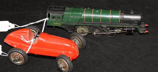 A Schuco Studio model clockwork 105 mercedes and a damaged Triang 259 locomotive